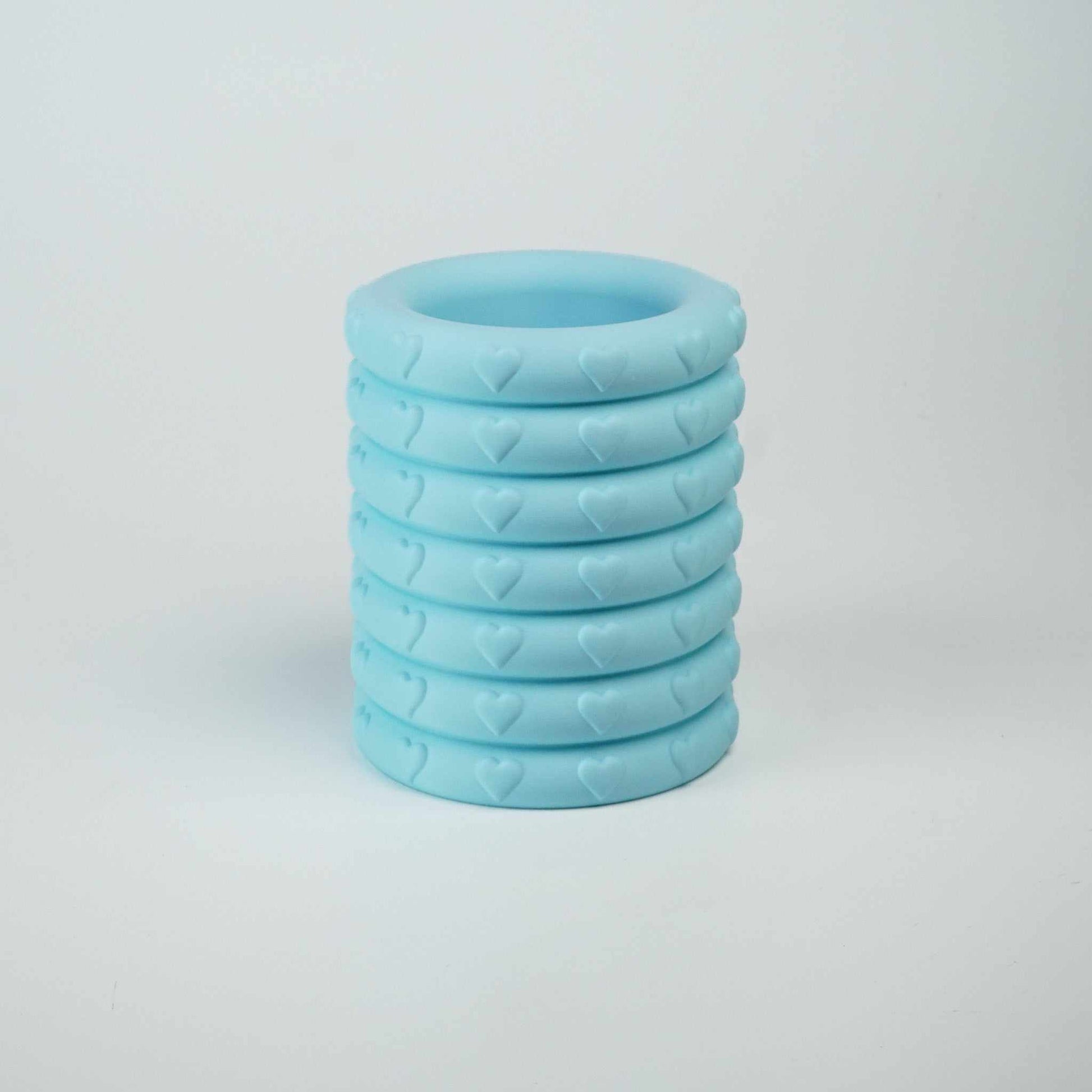 3D printed blue heart vase with glass insert, made from recyclable PLA filament. Blue printed Vase