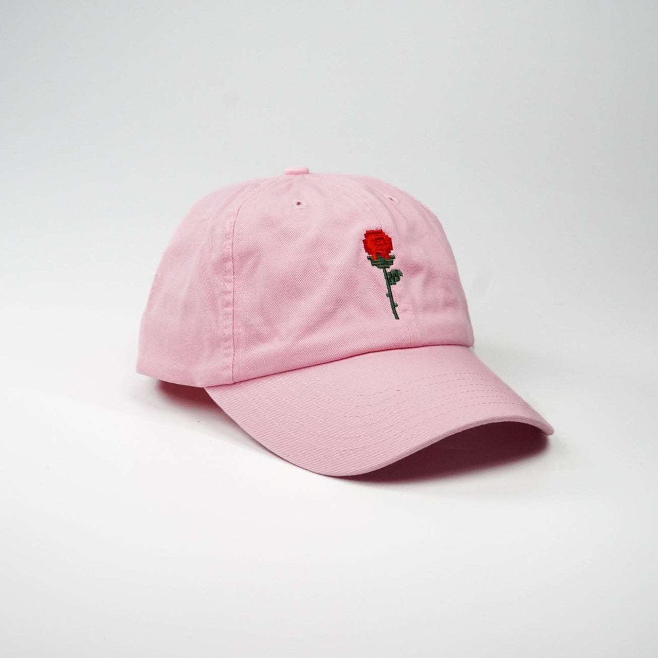 Crushes Pixel Rose Pink Cotton Cap with embroidered rose design, adjustable fit, 100% cotton.