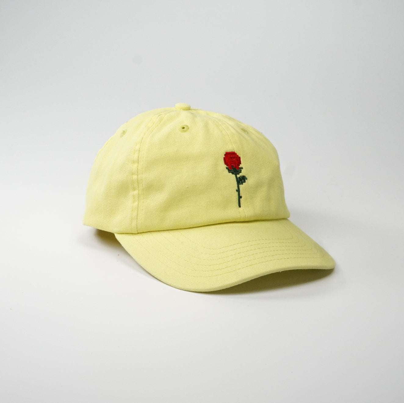 Crushes Pixel Rose Yellow Cotton Cap with embroidered red rose, adjustable fit, 100% cotton.