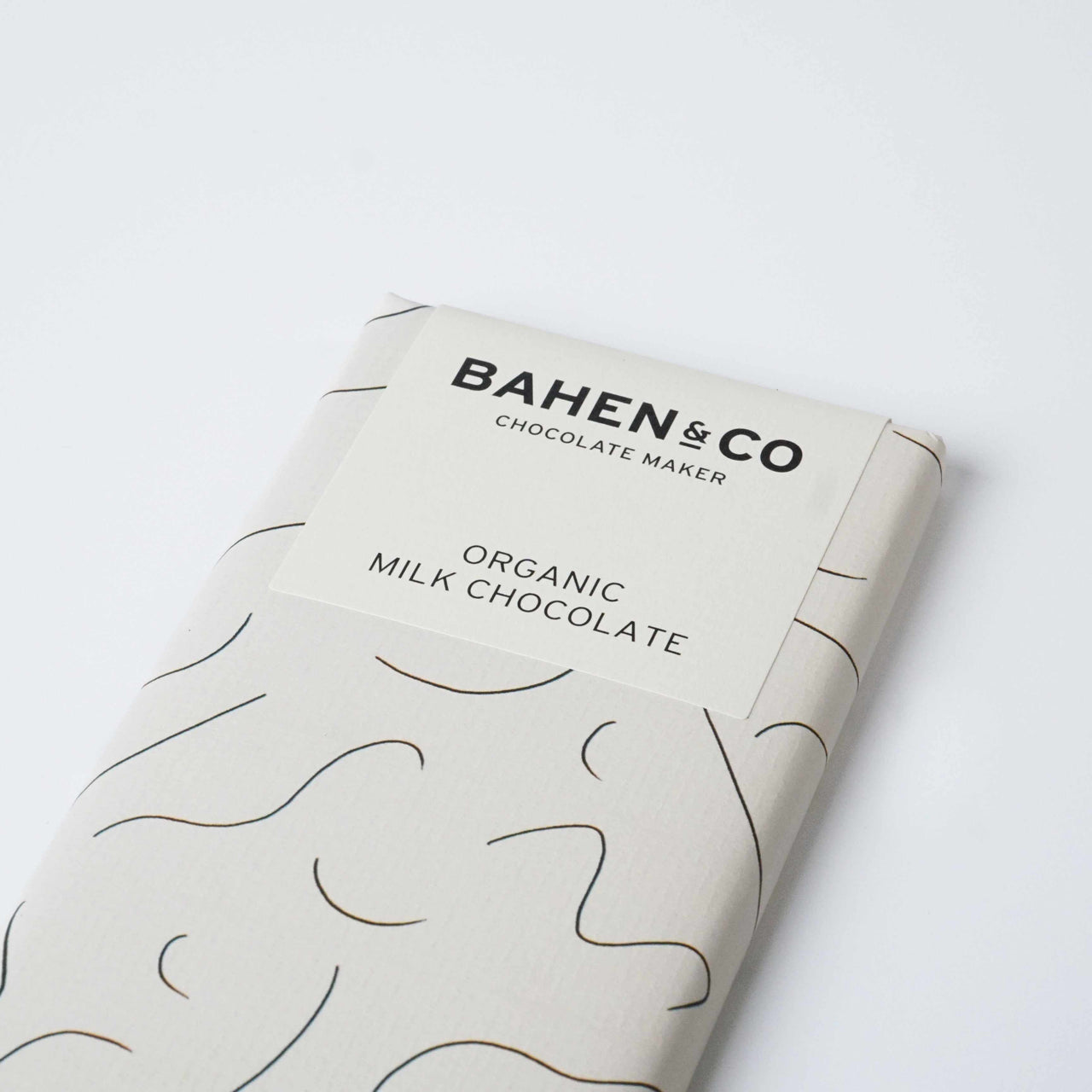 Bahen&Co Organic Milk Chocolate packaging with minimalist design.