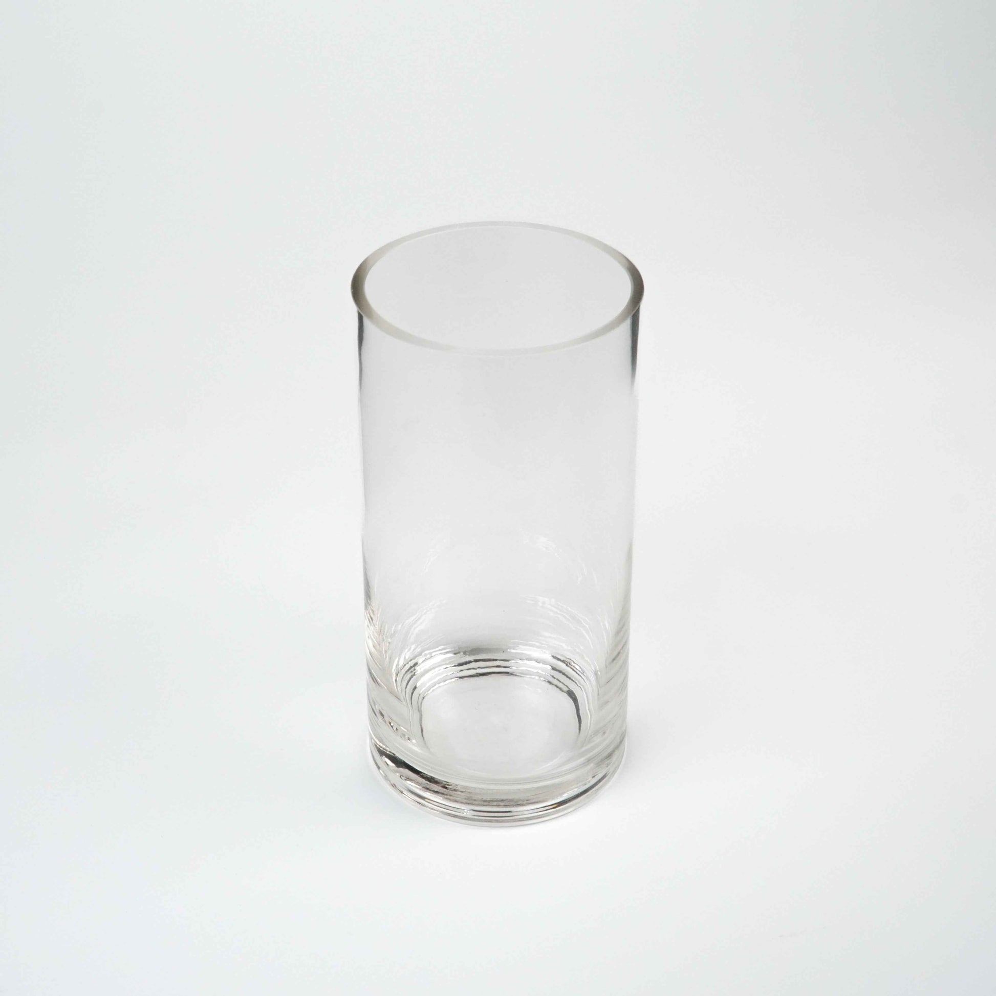 Fine glass vase, clear cylindrical design, 20 cm high x 10 cm wide.