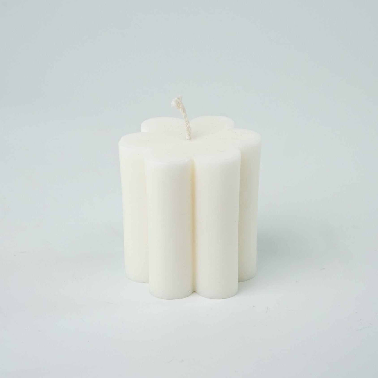 Flower candle with delicate petals, poured in Australia, 7.2cm x 6.6cm, ideal for arrangements.