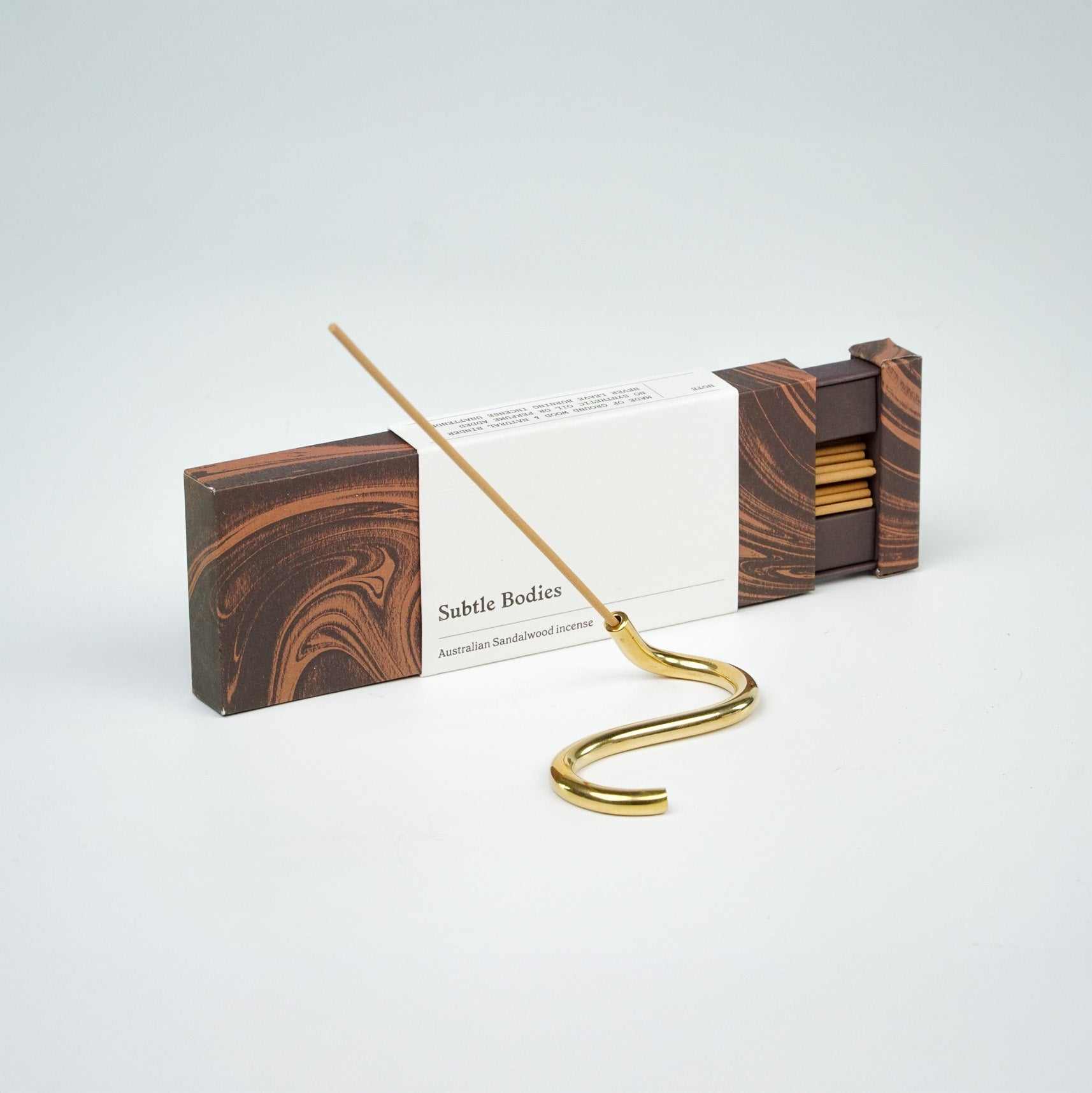 Incense sets with sticks and brass holder in snake design, handcrafted, Subtle Bodies brand.