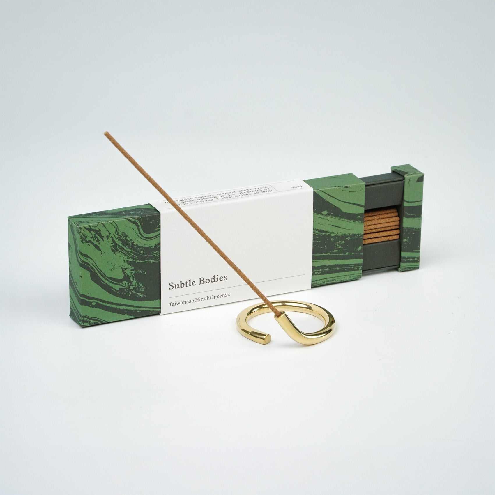 Incense sets with brass snake holder and box of sticks.