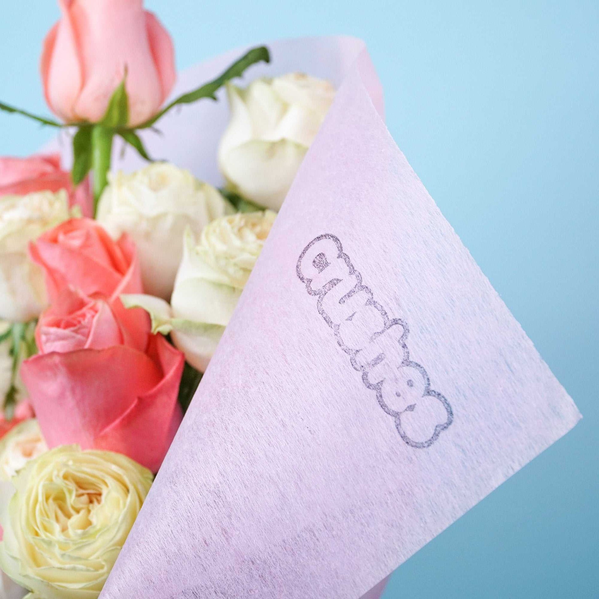 The No.11 Candy Crush Valentine's rose bouquet with pink and white hues in custom Crushes box.