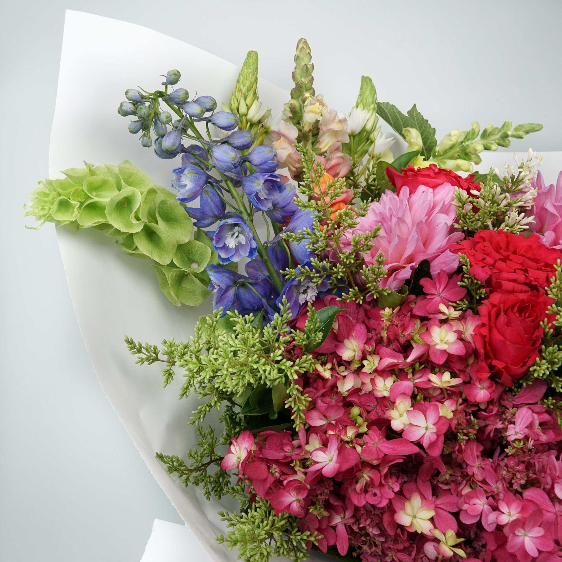 Extra large floral arrangement with gerberas, roses, dahlias, snapdragons, and hydrangea. Extra Large Crush