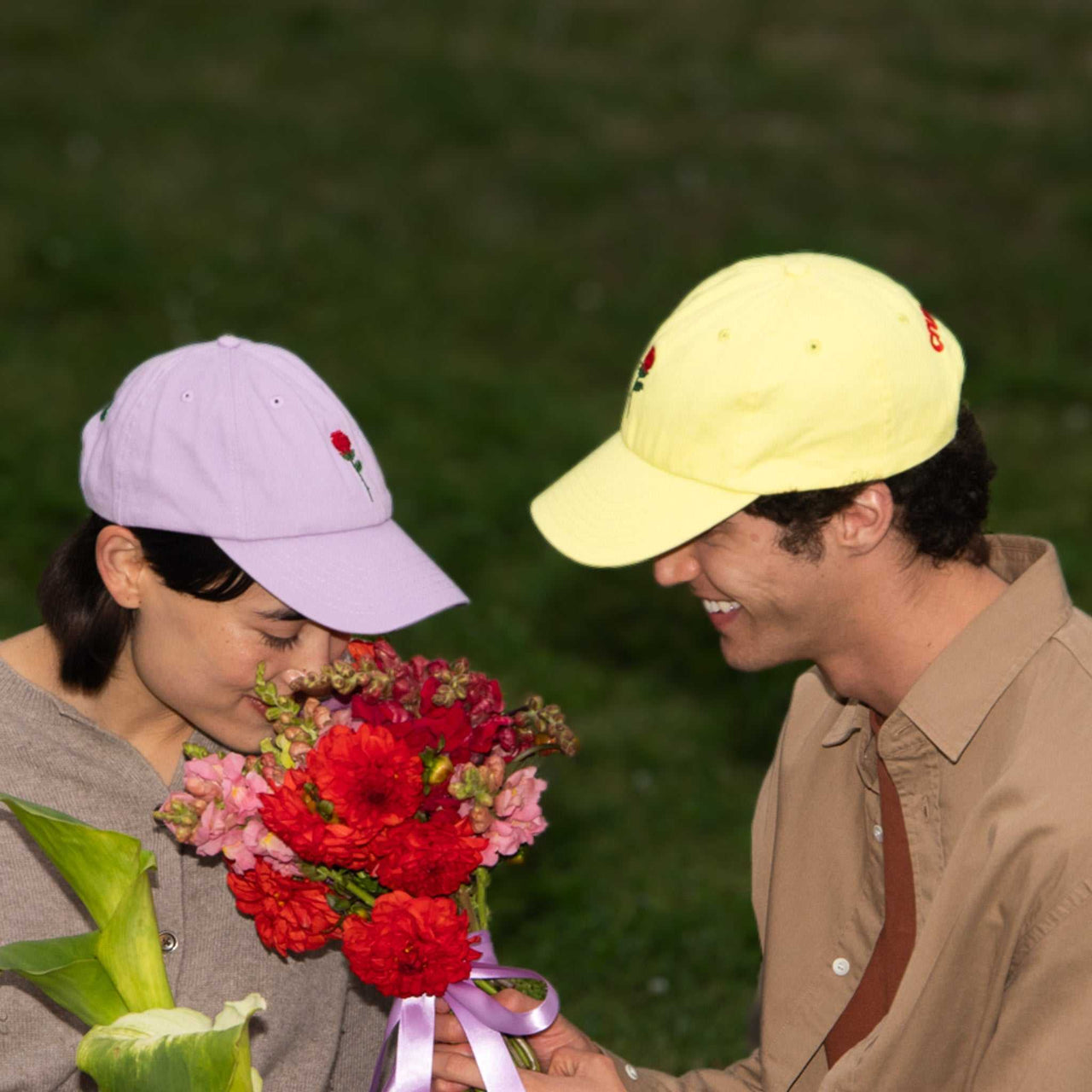 Adjustable Black Cotton Cap with an embroidered pixel rose design, made from 100% cotton.