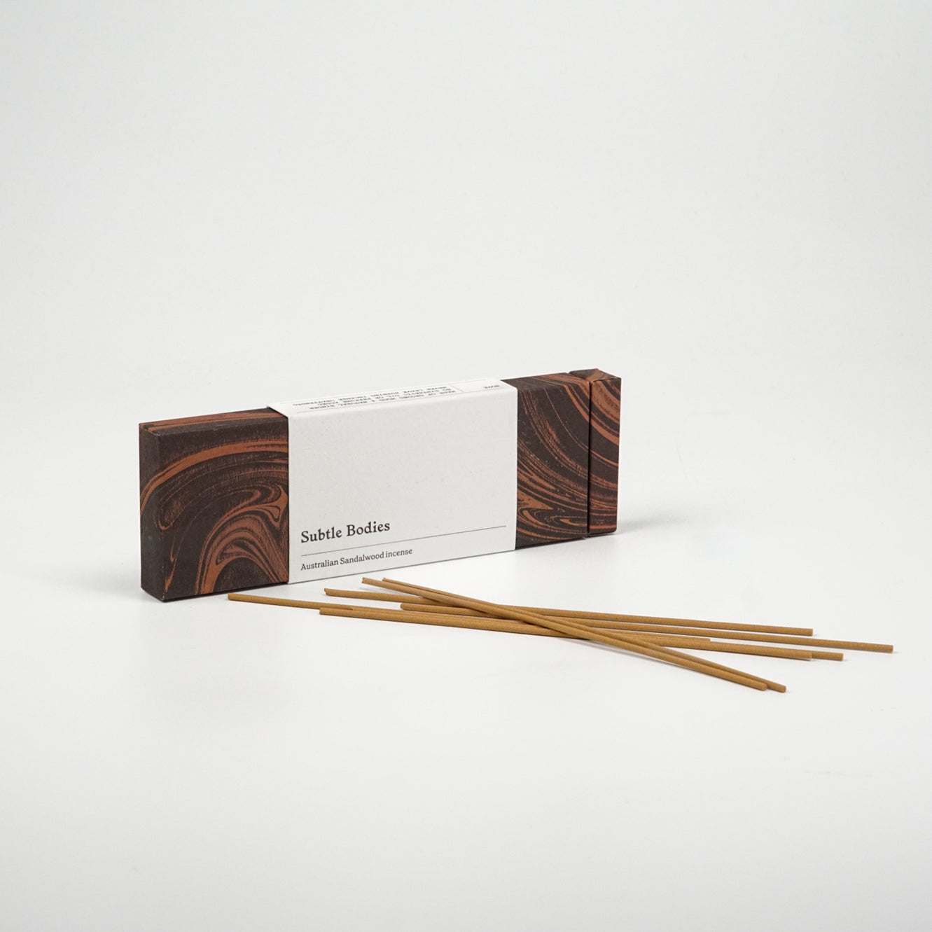 Sandalwood Incense sticks of Australian Sandalwood by Subtle Bodies, in sleek packaging, offering pure, fragrant wood scent.