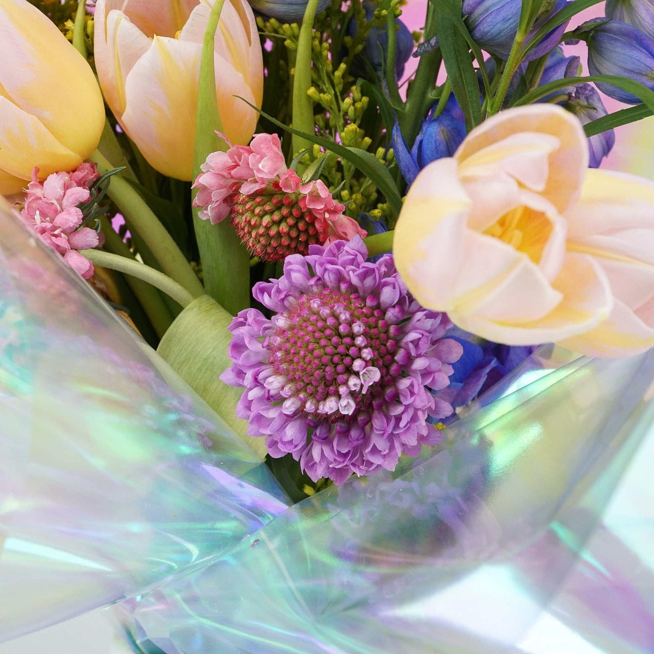 The No.01 Florist choice bouquet with tulips, delphinium, pincushions, and assorted field flowers in a decorative vase.